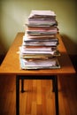 stack of resumes on an office table