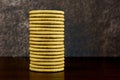 A Stack of Rich Tea Biscuits on a Wooden Shelf