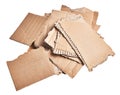 Stack of ripped pieces of cardboard material over isolated white background