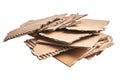 Stack of ripped pieces of cardboard material over isolated white background