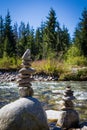 Stack of rocks at the bank of mountain river Royalty Free Stock Photo