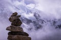 Stack of rocks in front of alpine background