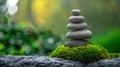 Stack of Rocks on Moss Covered Rock