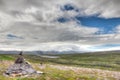 Stack of rocks and Norwegian landscape