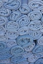 Stack of rolled blue towels