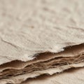 A stack of rough textured beige paper sheets is in close up view Royalty Free Stock Photo
