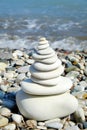 Stack of round smooth stones on a seashore. Balance peace silence concept Royalty Free Stock Photo