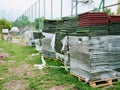 Stack of rubber floor tile mats and artificial turf