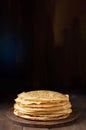 Stack of russian pancake blini on a wooden background Royalty Free Stock Photo