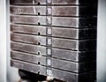 Stack of rusty metal weights in gym bodybuilding equipment