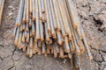 Stack of rusty round steel bar - iron metal rail lines material Royalty Free Stock Photo