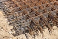 Stack of rusty wire mesh at a construction site. Metal building grate. Royalty Free Stock Photo