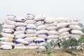 A stack of sacks of crop fertilizer