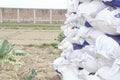 A stack of sacks of crop fertilizer