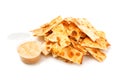 Stack of salted crackers isolated on white background