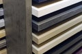 Stack of samples of laminate for the production of furniture, close-up Royalty Free Stock Photo