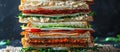 Tower of Bacon, Lettuce, Tomato, and Cheese Sandwiches Royalty Free Stock Photo