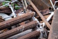 Stack of scrap metal, cast iron radiator in front. Recycling and garbage Royalty Free Stock Photo