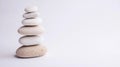 A stack of seven pebbles in various shades of white and beige. Royalty Free Stock Photo
