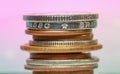 Stack of several different country coins close up shot