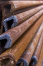 A stack of sheet pile elements with the cross section of the spring area and along the profile of the spring with selective focus