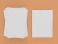 Stack and sheet of white paper and on a wooden background. Royalty Free Stock Photo