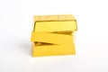 Stack of shiny gold bars on white background Royalty Free Stock Photo
