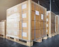 Stack of shipment boxes on wooden pallet. Cargo & shipping warehousing, Logistics and transportation Royalty Free Stock Photo