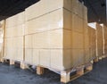 Stack of shipment boxes on wooden pallet the warehouse storage. Cargo export & shipping warehousing, Logistics and transportation Royalty Free Stock Photo