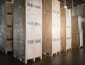 Stack of shipments boxes on pallet waiting for load into a truck. Road freight cargo industry.