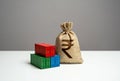 Stack of shipping containers and indian rupee money bag. GDP and production.