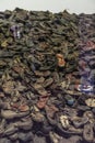 Oswiencim, Poland - September 21, 2019: Stack of shoes who once belonged to the jews and other prisoners from Auschwitz