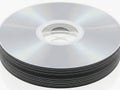 Stack of silver cds against a white background Royalty Free Stock Photo