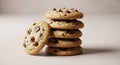A stack of six chocolate chip cookies is arranged on a light surface. Each cookie is Royalty Free Stock Photo
