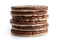 Stack of six chocolate rice cakes isolated on white. Royalty Free Stock Photo