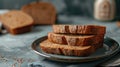 a stack of sliced brown bread on a plate alongside a milk bottle, set against a grey background for a sleek and simple Royalty Free Stock Photo