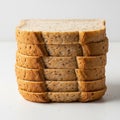 Stack of Sliced Whole Wheat Bread on White Surface loaf Royalty Free Stock Photo