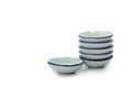 Stack of small bowls on white background Royalty Free Stock Photo
