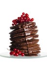 Stack of Small Chocolate Pancakes and flowing chocolate syrup wi Royalty Free Stock Photo