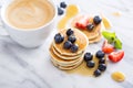 Stack of small pancakes with fresh berries Royalty Free Stock Photo