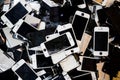 Stack of smart phones with cracked and damaged LCD screen Royalty Free Stock Photo