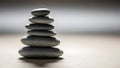 Stack of smooth balanced gray stones on neutral surface with soft background Royalty Free Stock Photo