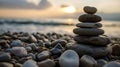 Stack of pebbles on the beach at sunset. Zen concept Royalty Free Stock Photo