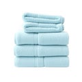 A stack of soft light blue terry cloth towels for bath and home use isolated on white background Royalty Free Stock Photo