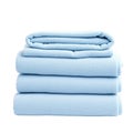 A stack of soft light blue terry cloth towels folded neatly isolated on white background Royalty Free Stock Photo