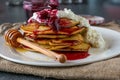 Stack of spelt pancakes with russian jam and cottage cheese Royalty Free Stock Photo