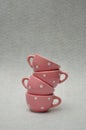 A stack of spotted porcelain tea cups Royalty Free Stock Photo