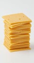 Stack of square cheese slices arranged on top of each other, displaying a pale yellow Royalty Free Stock Photo