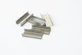 Stack of staples over a white background Royalty Free Stock Photo