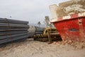 Stack of steel construction material and solid steel shafts